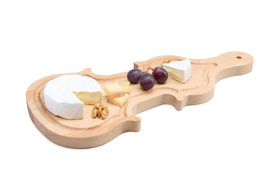 A unique violin-shaped beech wood board that turns any serving into a statement. Crafted from solid oiled beech, it is ideal for cheese, charcuterie and snacks, and makes an original gift for music lovers. Sturdy, knife-friendly and easy to maintain. Size: 400 x 280 x 20 mm.