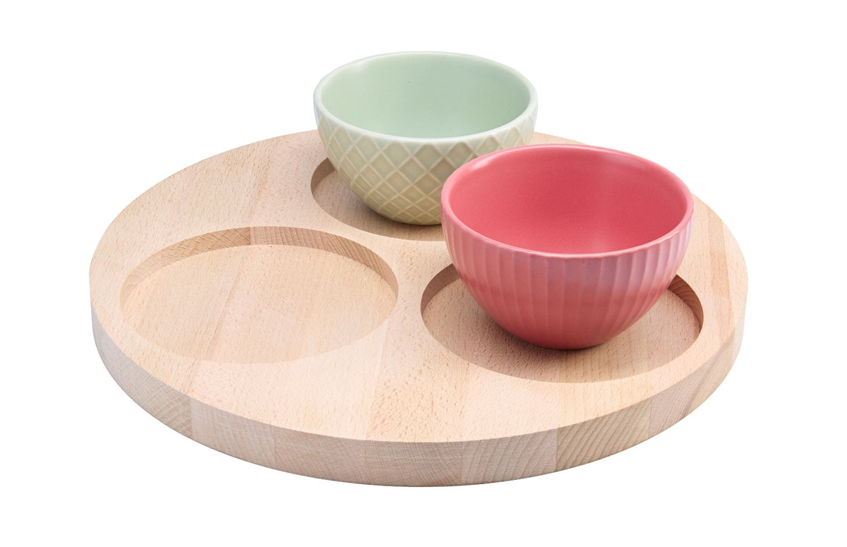 Round natural beech wood serving board with three cut-outs for dips, sauces or small bowls. Perfect for appetizers, tapas, pizza nights and party platters. Crafted from solid untreated beech for a clean, natural look. Size: Ø 280 mm, 20 mm thick.